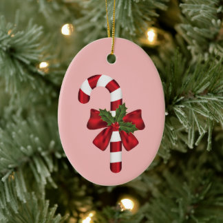 Candy Cane With A Bow And Christmas Holly On Pink Ceramic Ornament