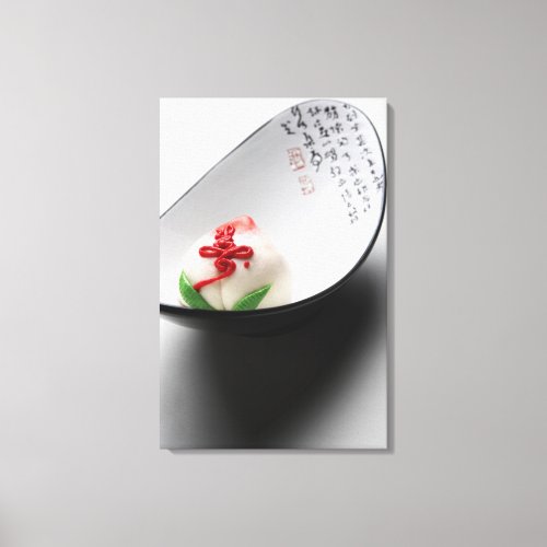 Candy flower bud in bowl canvas print