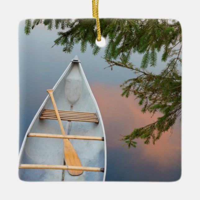 Canoe on lake at sunset, Canada Ceramic Ornament (Front)