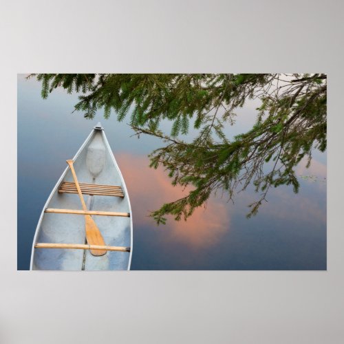 Canoe on lake at sunset Canada Poster