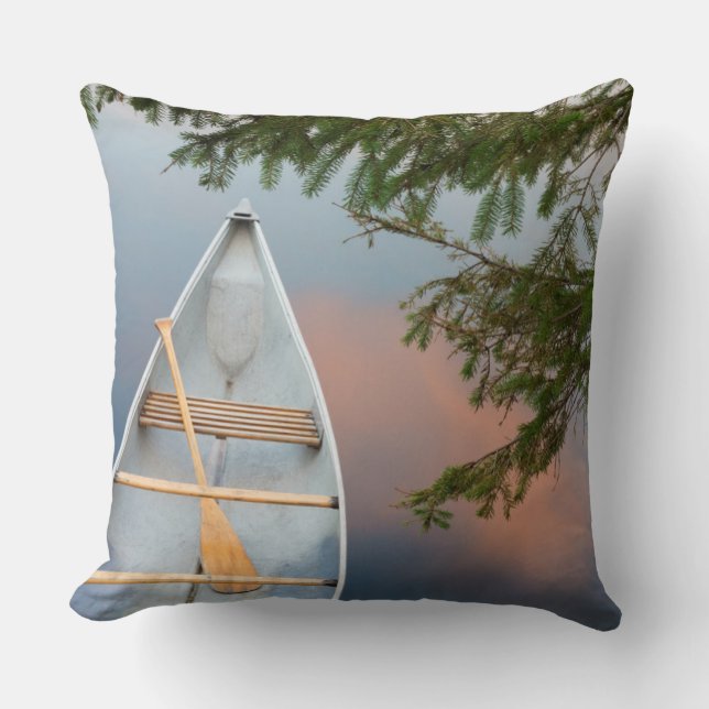 Canoe on lake at sunset, Canada Throw Pillow (Front)