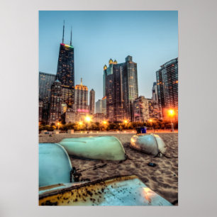 Canoes on Oak Street Beach a little after sunset Poster