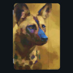 Cão Selvagem Africano iPad Pro Cover<br><div class="desc">A digital painting that merges hyper-realism with bold, contemporary abstraction. This captivating portrait of a African Wild Dog showcases a harmonious clash of vibrant hues deep blues, golden ochres, and electric greens that breathe life into every fur strand and shadow. The textured, almost cubist brushstrokes add depth and movement, transforming...</div>