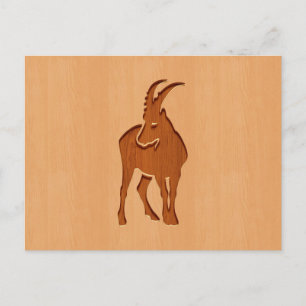 Capricorn silhouette engraved on wood design postcard