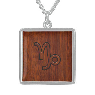 Capricorn Zodiac Symbol in Wood Grain Style Sterling Silver Necklace