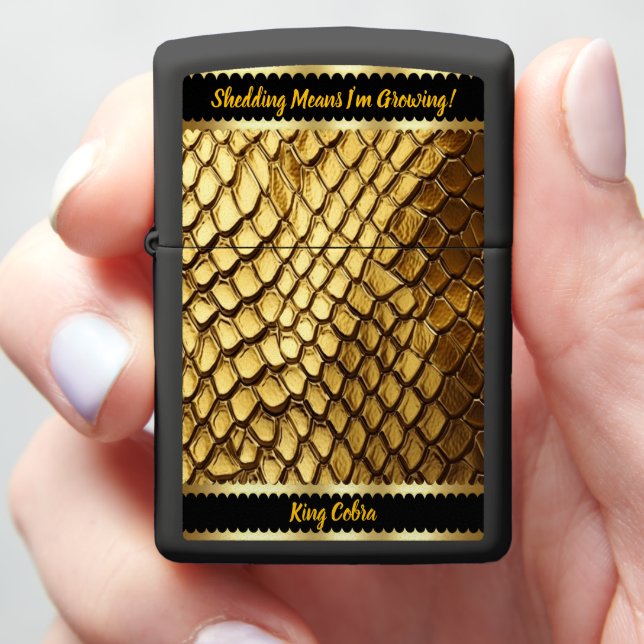 Captivating golden snake skins shimmering in light zippo lighter (In Hand)