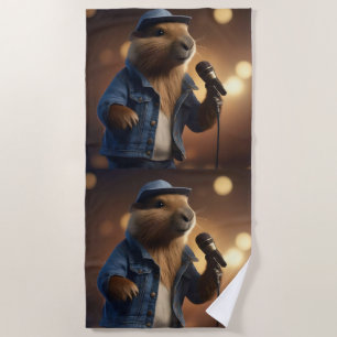 "Capybara Cowboy: Serenading the Wild West" Beach Towel
