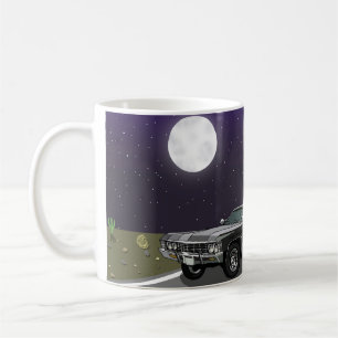 Car in desert night coffee mug