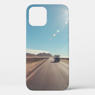 Car on black asphalt road iPhone 12 case