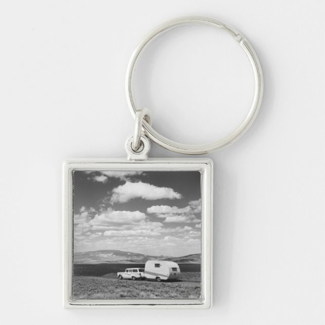 Car pulling trailer on road keychain (Front)