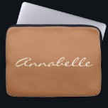 Caramel Brown Script Name Minimalist Personalized Laptop Sleeve<br><div class="desc">This laptop sleeve features a warm caramel brown background with a name in flowing cream script right across the front — simple, personal, and really easy to spot in a bag. It's a great gift for a college student, a new grad, or really anyone who wants their laptop to feel...</div>