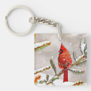 Cardinal in a pine tree keychain
