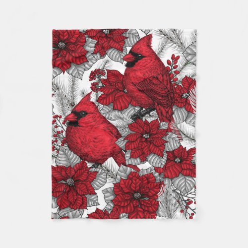 Cardinals and poinsettia in red and white fleece blanket