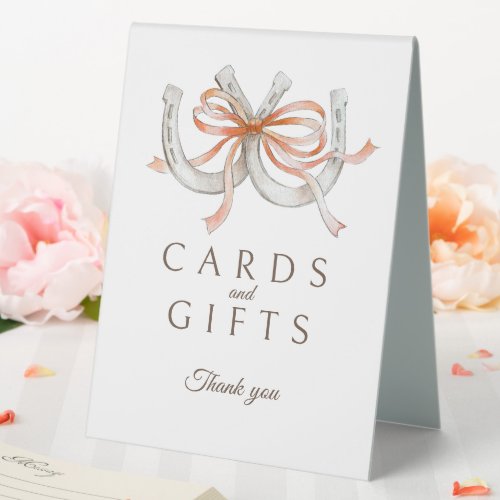 Cards gifts orange ribbon horseshoes wedding sign