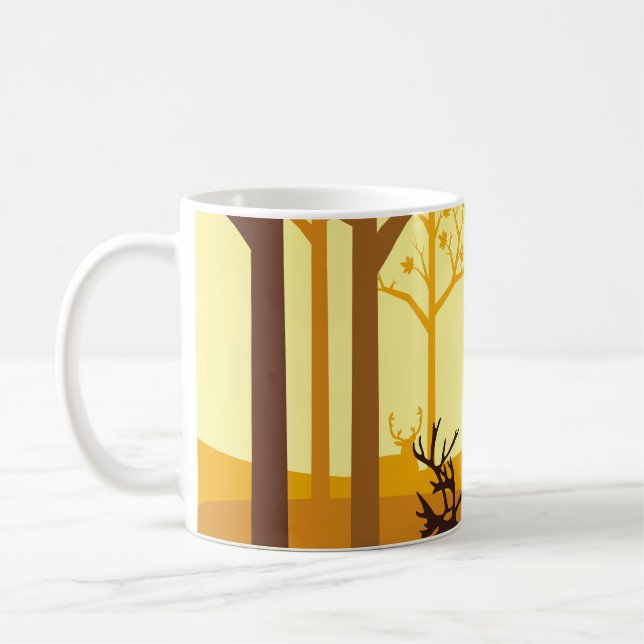 Caribou silhouette in the forest on the autumn sea coffee mug (Left)