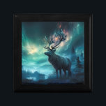 Caribou Under The Northern Lights Gift Box<br><div class="desc">A caribou stands on a hillside,  surrounded by tall evergreen trees. Below lays a lake,  shrouded in mist and fog. Above lies a starry sky,  illuminated by a magnificent display of the Northern Lights,  shining in reds,  yellows,  and neon blues,  with a diffused green glow all about.</div>