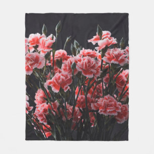 Carnation flowers bouquet vintage color toned over fleece blanket