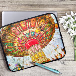 Carnival swing ride vintage retro blue sky graphic laptop sleeve<br><div class="desc">Relive the childhood memories of soft breezes, happy screams, and birds-eye views whenever you use this colorful photo photo neoprene laptop sleeve of a red, yellow, turquoise, and green amusement park swing ride against a blue sky. This laptop sleeve comes in three sizes: 15", 13", and 10”. Makes a great...</div>