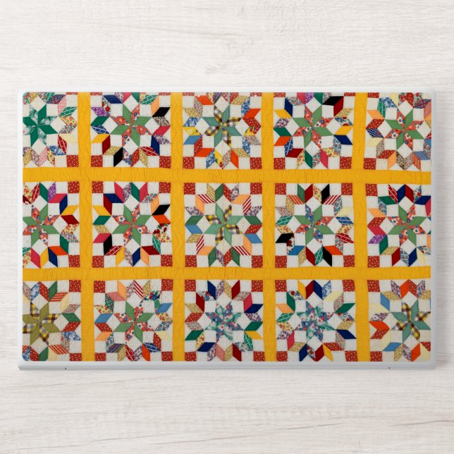 Carpenter’s wheel quilt HP laptop skin (Front)
