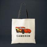 Cars Lightning McQueen Smiling Disney Tote Bag<br><div class="desc">Carry the excitement of Radiator Springs with the Cars Lightning McQueen Smiling Disney Tote Bag! Featuring Lightning McQueen with his signature confident smile, this bold and colorful design is perfect for fans of Disney Pixar’s Cars. Whether for everyday use, shopping, or as a fun accessory, this tote bag brings high-speed...</div>