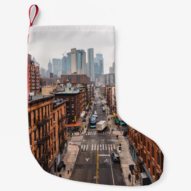 CARS ON ROAD BETWEEN HIGH RISE BUILDINGS DURING DA SMALL CHRISTMAS STOCKING (Front)