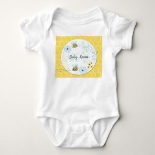 Cartoon bumblebees on a background of blue, yellow baby bodysuit