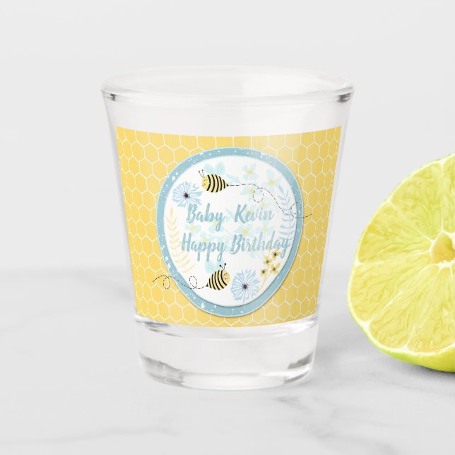Cartoon bumblebees on a background of blue, yellow shot glass (Front)