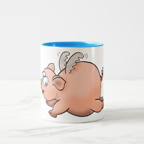 Cartoon drawing of a pig with wings flying Two_Tone coffee mug