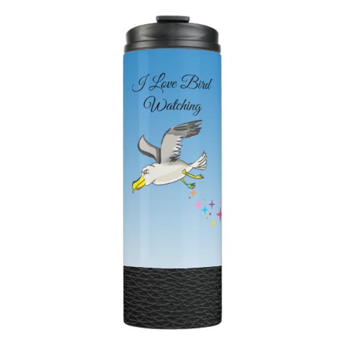 Cartoon seagull flying over head with a blue sky thermal tumbler