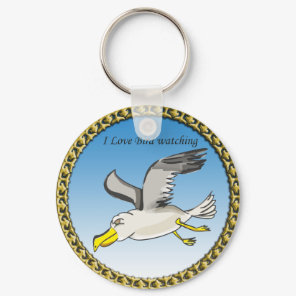 Cartoon seagull flying over head with a gold frame keychain