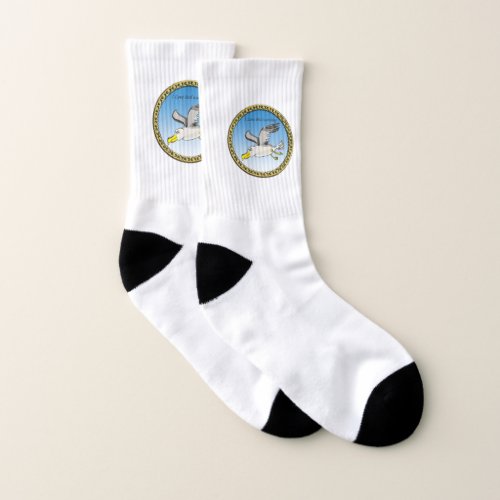 Cartoon seagull flying over head with a gold frame socks