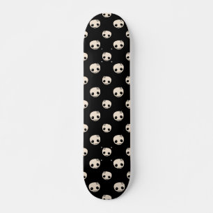 Cartoon Skulls with Star Bow on Black Background Skateboard