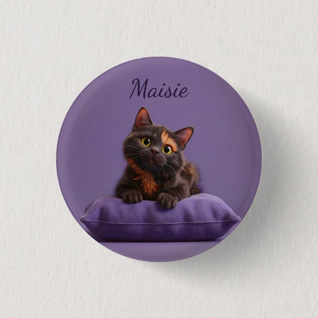 Cartoon Tortoiseshell Kitten on Purple Cushion Button (Front)