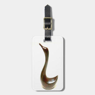 carved bird tag