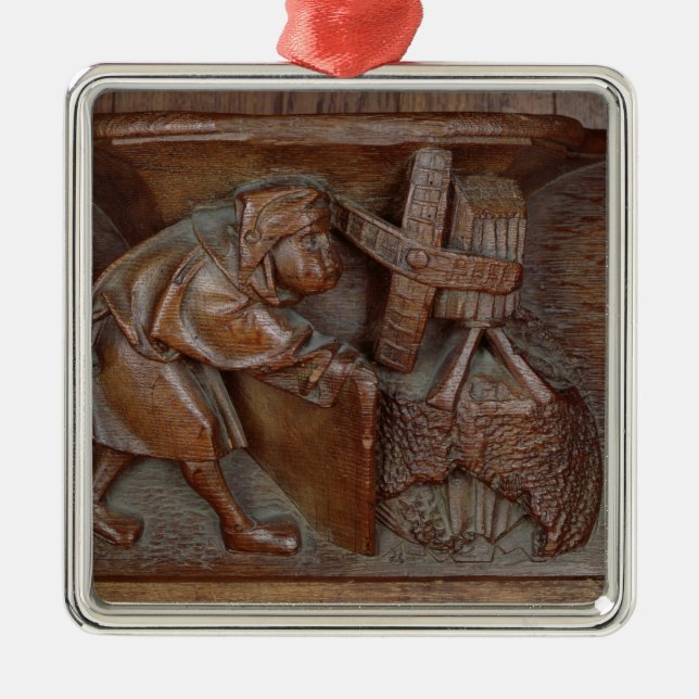 Carving of a miller, from a choir stall metal ornament (Front)