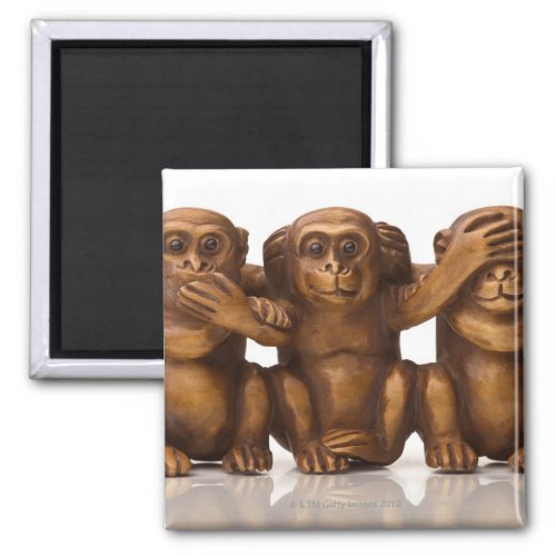 Carving of three wooden monkeys magnet