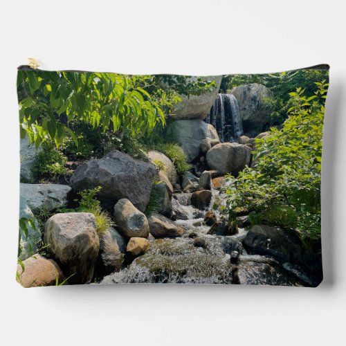 Cascading forest waterfall  forest greenery   accessory pouch