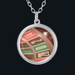 Casino Gambling Roulette Wheel Vintage Retro Style Silver Plated Necklace<br><div class="desc">A close up image of a gaming casino roulette wheel with large numbers. The colors are reminiscent of retro designs from the fifties and the  numbers have a faded vintage look to them.</div>