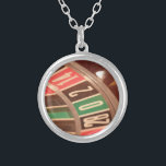 Casino Gambling Roulette Wheel Vintage Retro Style Silver Plated Necklace<br><div class="desc">A close up image of a gaming casino roulette wheel with large numbers. The colors are reminiscent of retro designs from the fifties and the  numbers have a faded vintage look to them.</div>