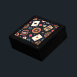 Casino pattern theme on black gift box<br><div class="desc">Casino items pattern on black background design.</div>