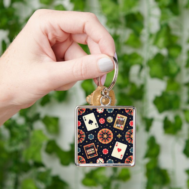 Casino pattern theme on black keychain (Hand)