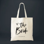 Casual Script | Chic Simple Bride Tote Bag<br><div class="desc">This stylish and chic bridal party gift bag features modern,  casual black script typography that says "Bride, " and a trendy scribbled heart,  with her name in simple bold text. The perfect elegant keepsake gift for the new bride.</div>