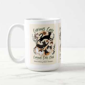 cat and a warm cup in hand