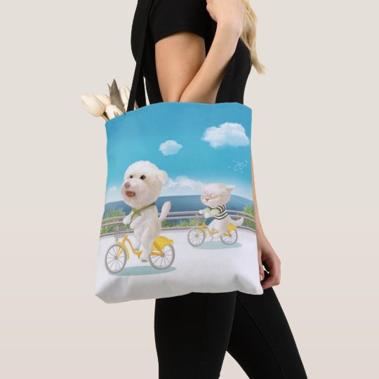 Cat and dog riding bicycle tote bag