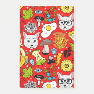 Cat and egg on red post-it notes