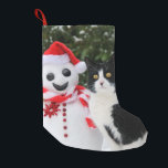 Cat and Santa Snowman Christmas mantle Small Christmas Stocking<br><div class="desc">A cute Tuxedo cat,  European Shorthair,  by the side of a Santa snowman on a cold wintry xmas day. This Santa xmas mantle decor is a humorous Christmas gift idea for catlovers.  Photographed by Katho Menden  http://www.zazzle.com/kathom_photo</div>