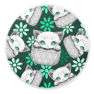 Cat Cute and Playful peaking from a Pocket Ceramic Knob