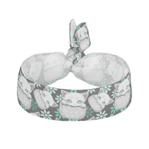 Cat Cute and Playful peaking from a Pocket Elastic Hair Tie