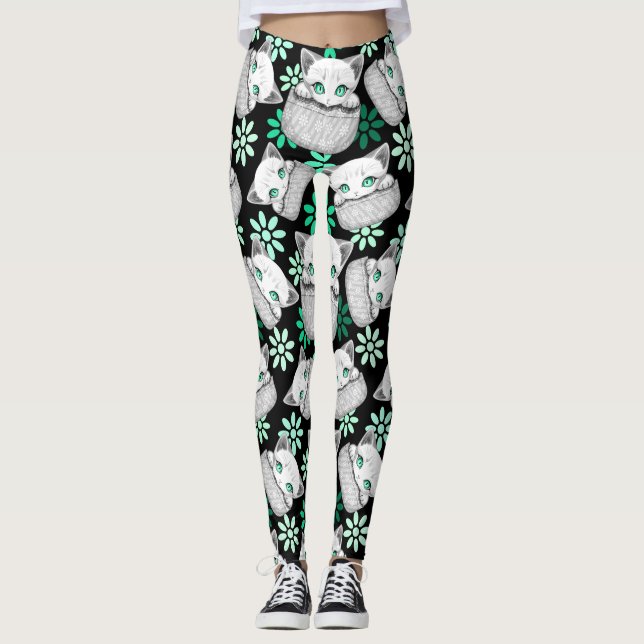 Cat Cute and Playful peaking from a Pocket Leggings (Front)