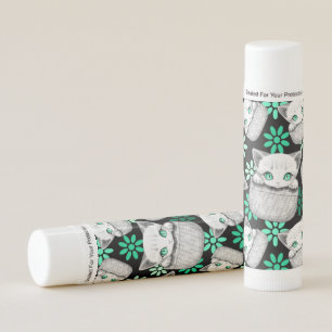 Cat Cute and Playful peaking from a Pocket Lip Balm